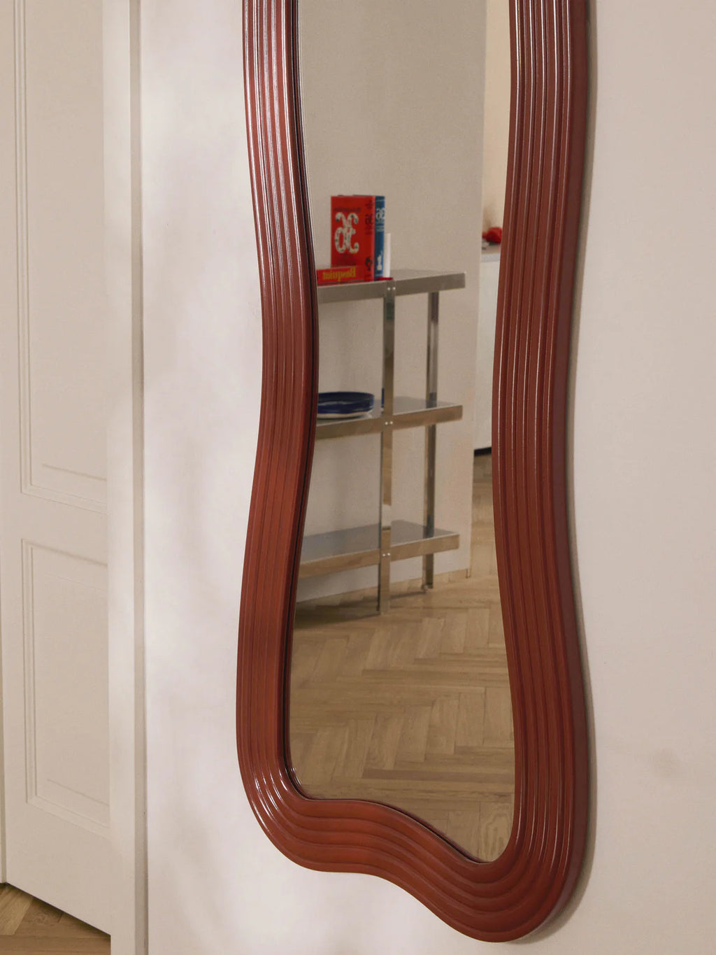 Cosimo wall mirror with wavy frame